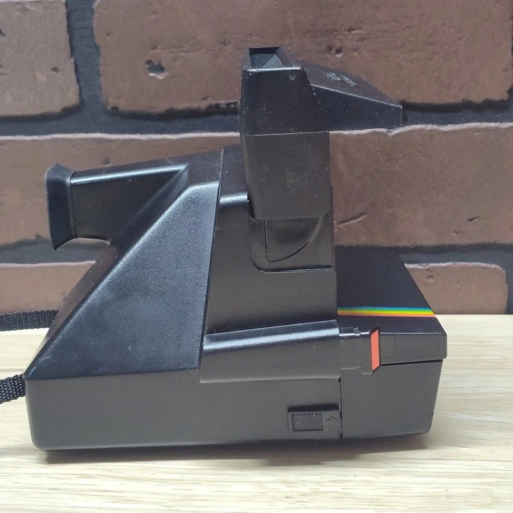 Polaroid please see